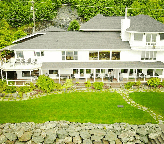 The owner lives in the upper part of the house. The round deck on the lower level in the apartment's private deck.