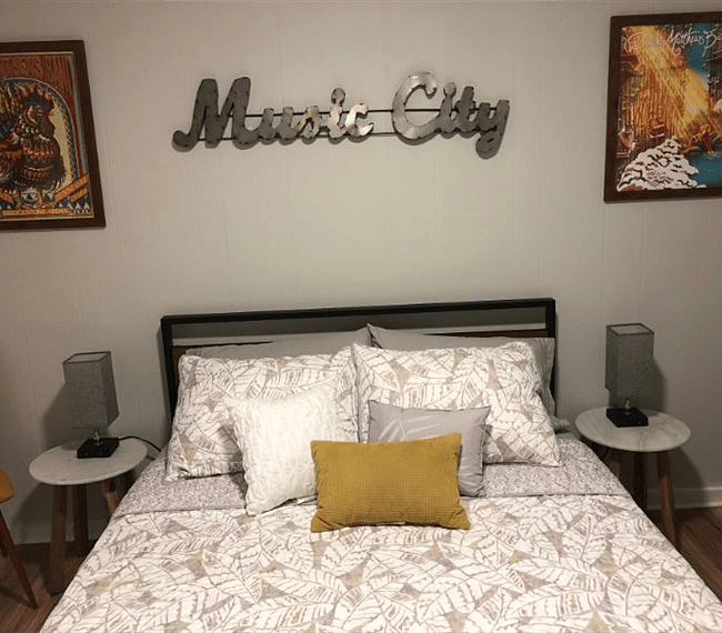 Queen size bed in main sleeping room.