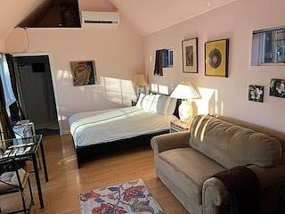 Queen bed and foldout sleeper loveseat