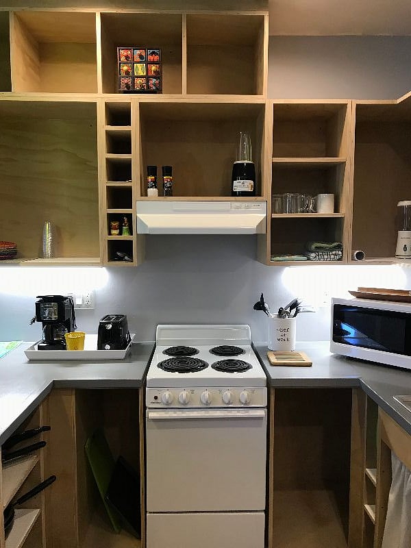 Stove, coffee maker, toaster, blender and microwave.