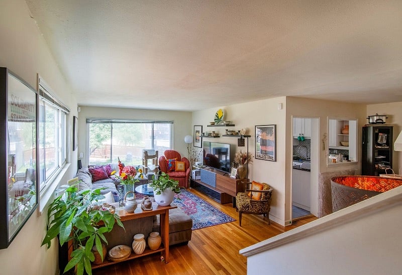 Main level with living room, dining area and kitchen.