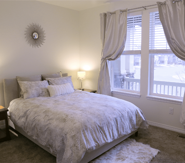 Queen sized super-comfy bed with blackout drapes