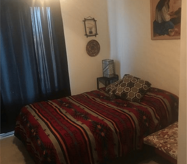 Bedroom with walk in closet