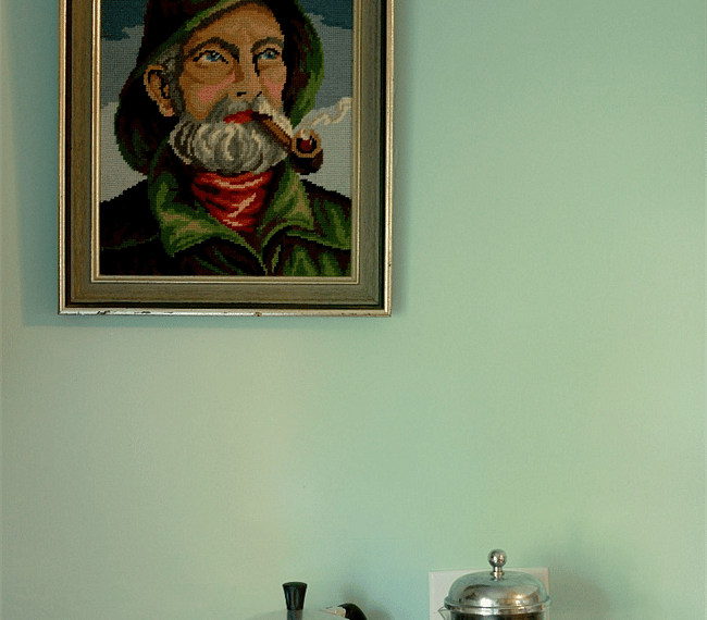 Our muse, the Captain in needlepoint.