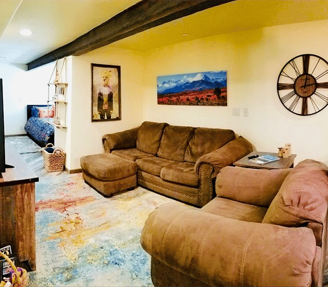 Queen size pull out couch and an over sized comfortable chair