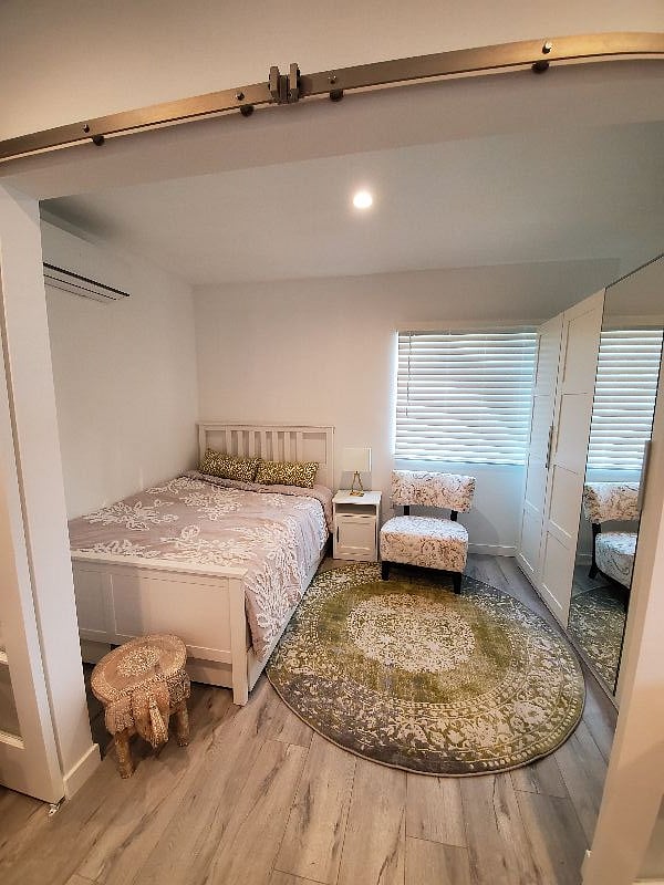 Bedroom with large closet for storage. Full size bed with storage drawers underneath also.