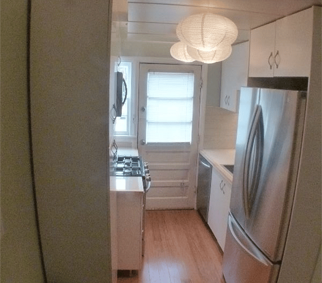 Newly-Renovated Kitchen with gorgeous new bamboo flooring and stainless appliances