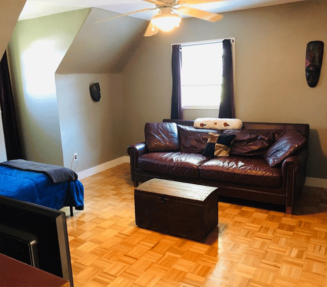 Private living quarters with ceiling fan
