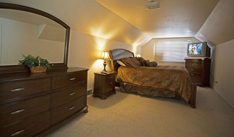 MATER BEDROOM WITH TV AND ATTACHED BATH