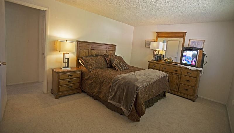 SECOND MASTER WITH OLYMPIC QUEEN BED, TV AND ATTACHED BATH