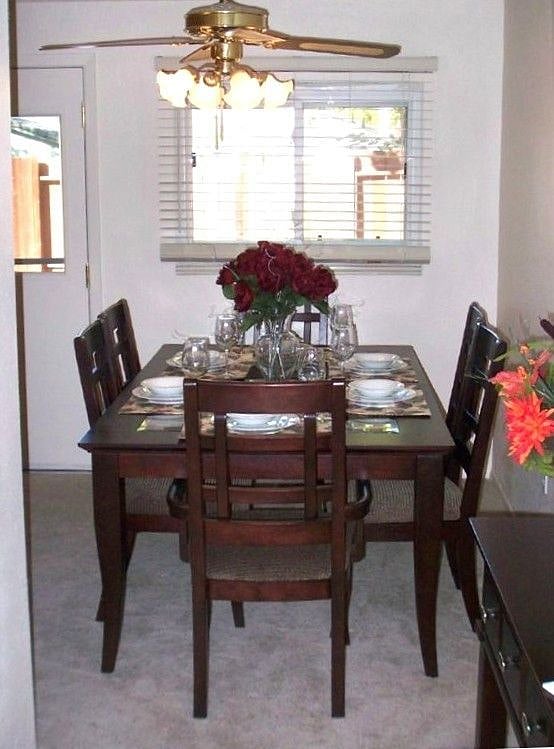 DINING FOR EIGHT WITH ADJACENT LAUNDRY ROOM