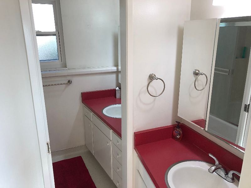 Large bathroom with individual sink and vanities. May be shared with separate unit single occupant.