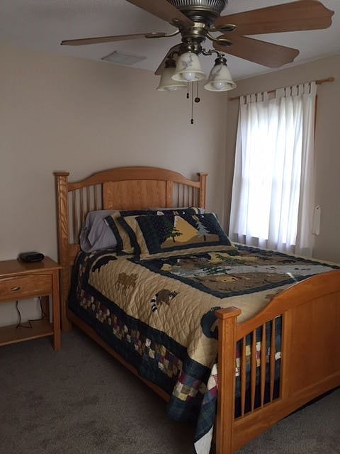 C Bedroom has a Queen size bed, 6 drawer dresser with mirror and double door closet with shelving. 