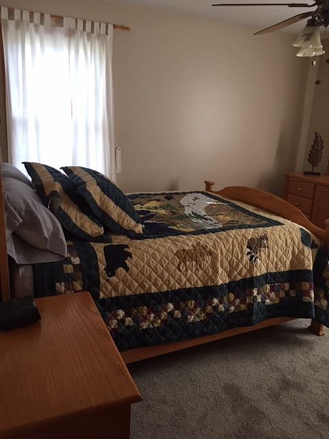 C Bedroom has a Queen size bed, 6 drawer dresser with mirror and double door closet with shelving. 