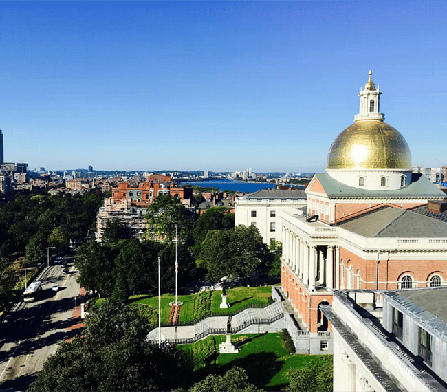 View of State house and Charles River from roof deck