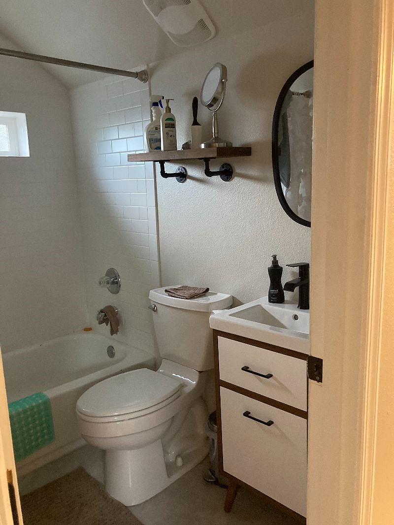 very cute upstairs bathroom, all tile floors