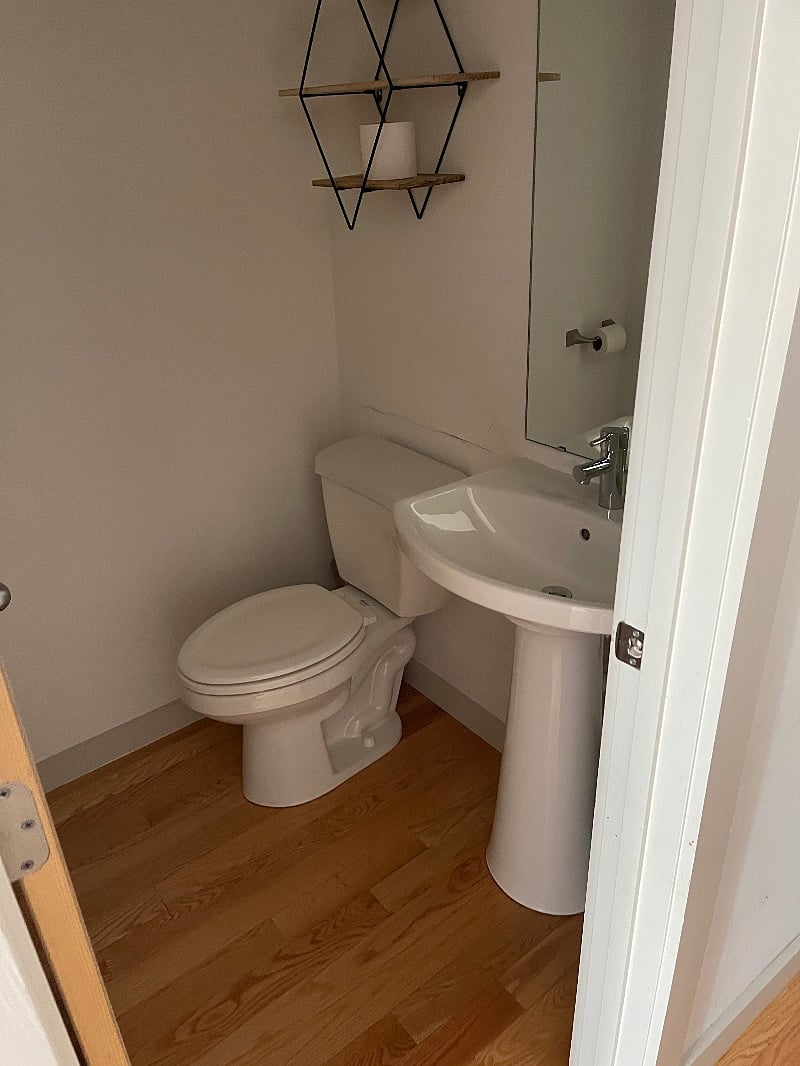 Living room-level half bath
