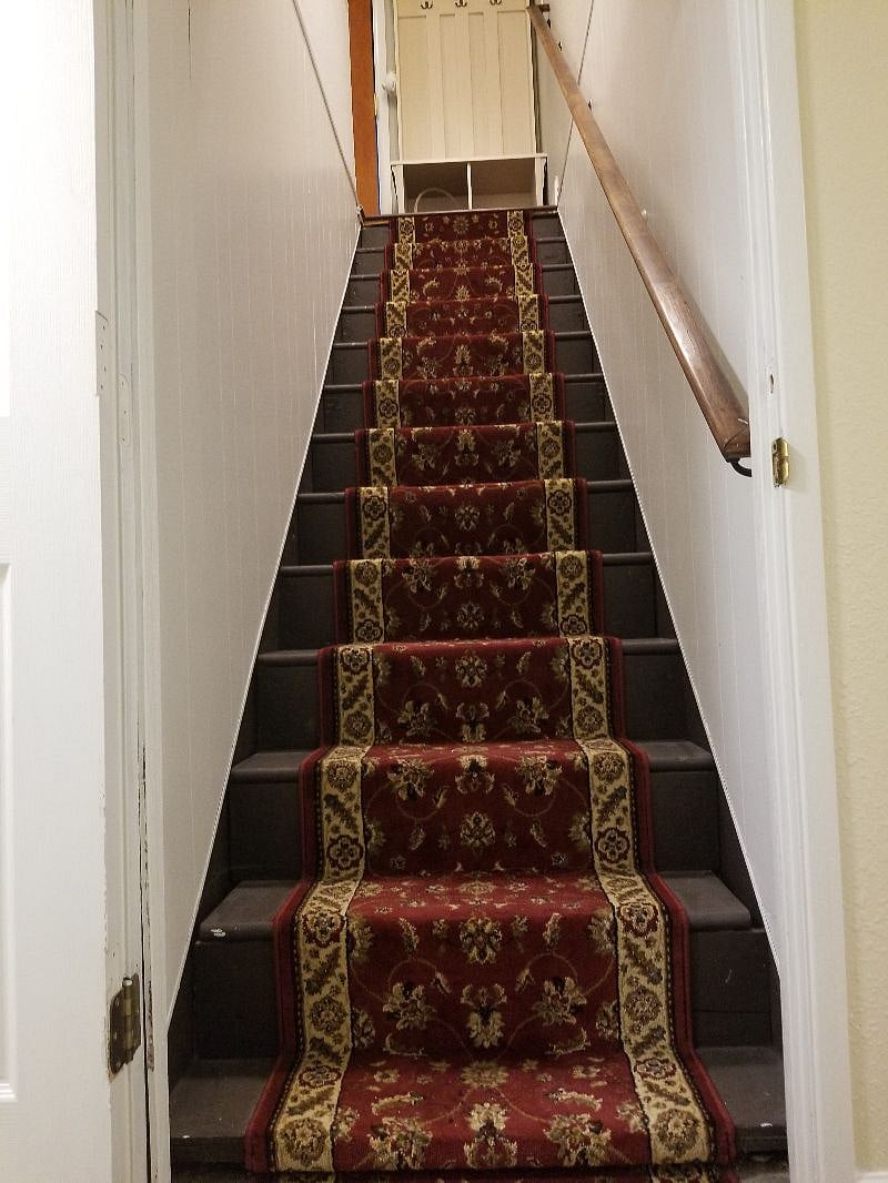 Stairs leading to Downstairs 3rd Bedroom with Private Bath, as well as Laundry Room.