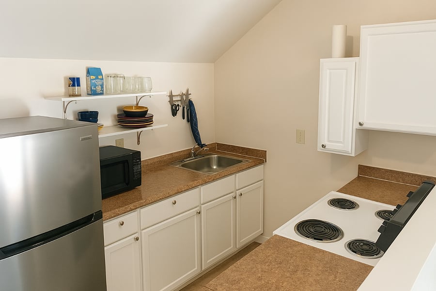 Fully equipped kitchen with full-sized appliances, cookware, and ample storage for everyday cooking.