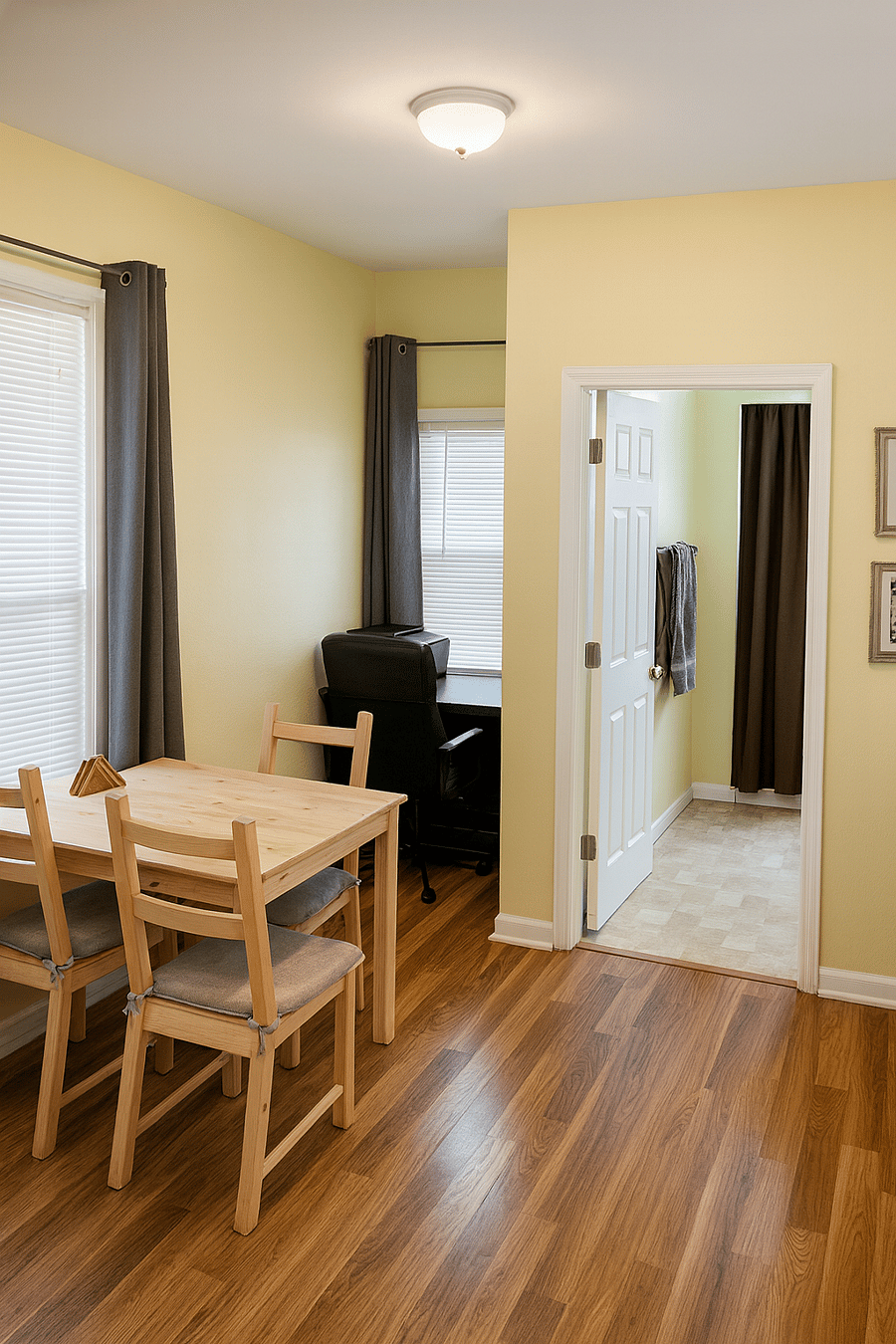 Dedicated dining area with seating for meals, and a desk for remote work or late charting.