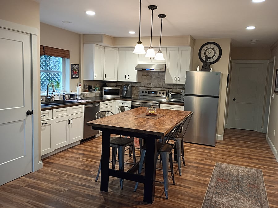 Kitchen with island table and 4 stools, Pro-line 600CFM vented fan,
