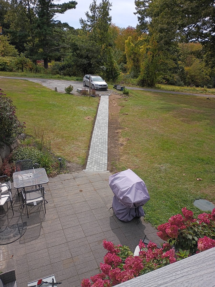 Newly added paver walkway to 2 space parking pad