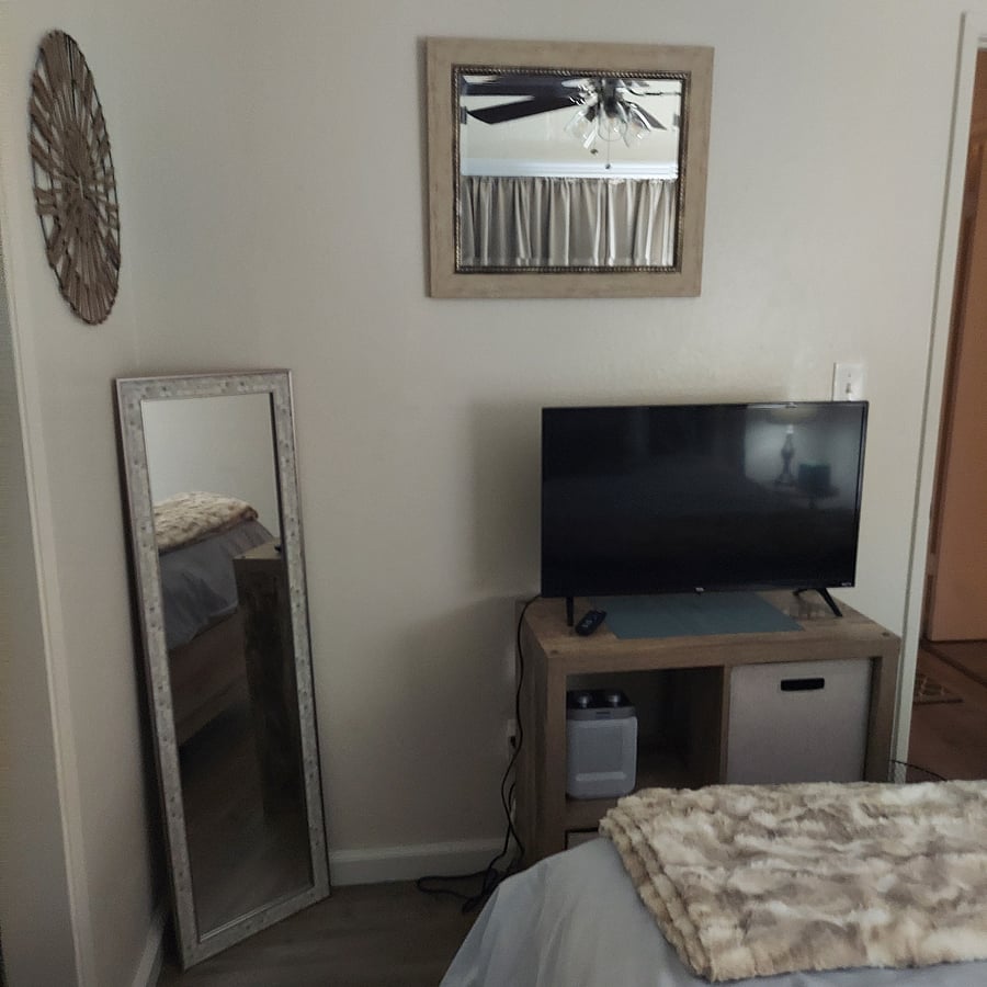 Bedroom 2-Comes with full size bed, smart tv, small dresser and storage in closet.