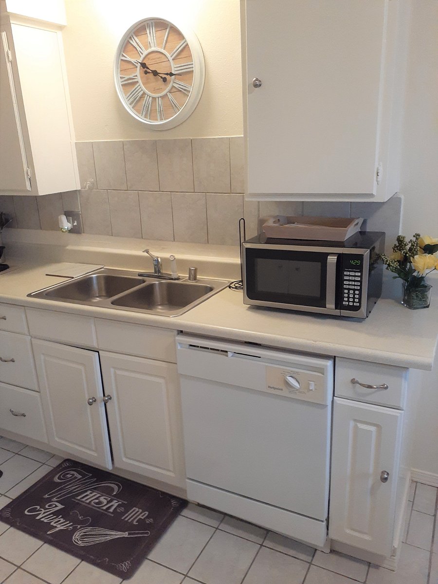 Kitchen sink and counter-Kitchen has full size appliances, microwave, dishwasher, Keurig, toaster, pots and pans, rice maker and utensils for four.