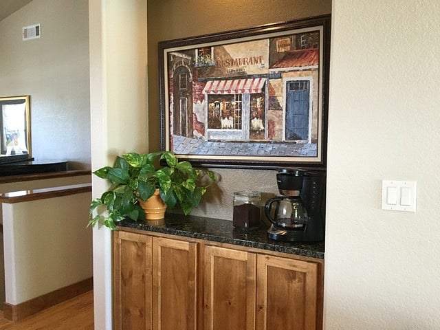 Beverage bar between kitchen and dining room main floor