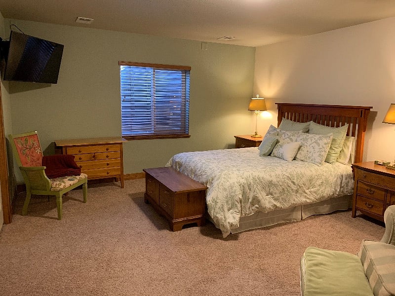More extra large bedroom with wall mounted TV