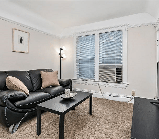 Living room angle from entry door. West facing windows.