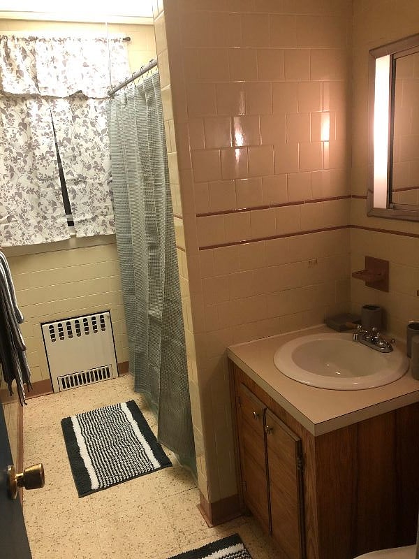There is a bath tub and shower as well.