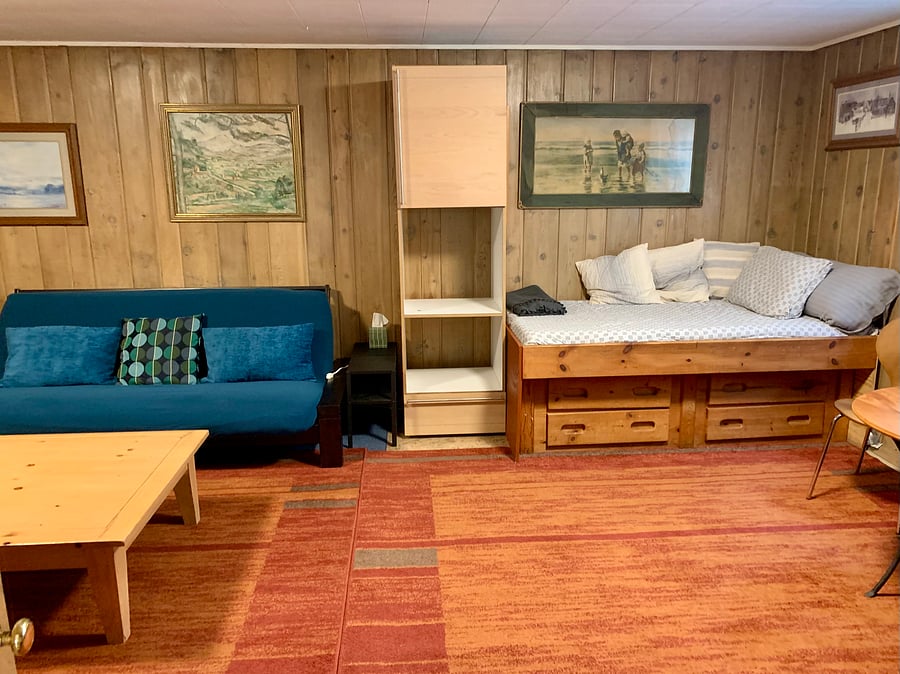 Queen-size futon and single daybed provide additional sleeping options.