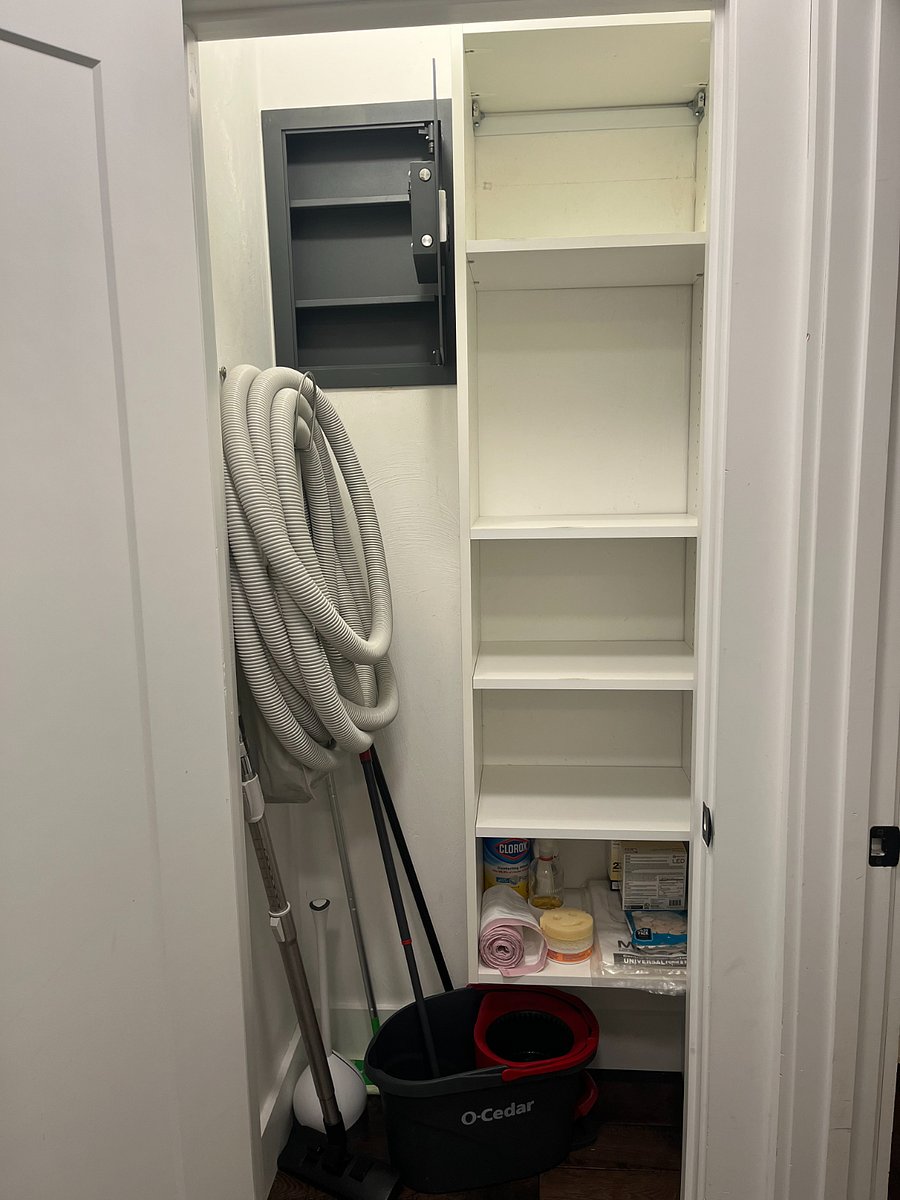 Utulities closet: central vacuum, mop, broom, plunger, cleaning products)