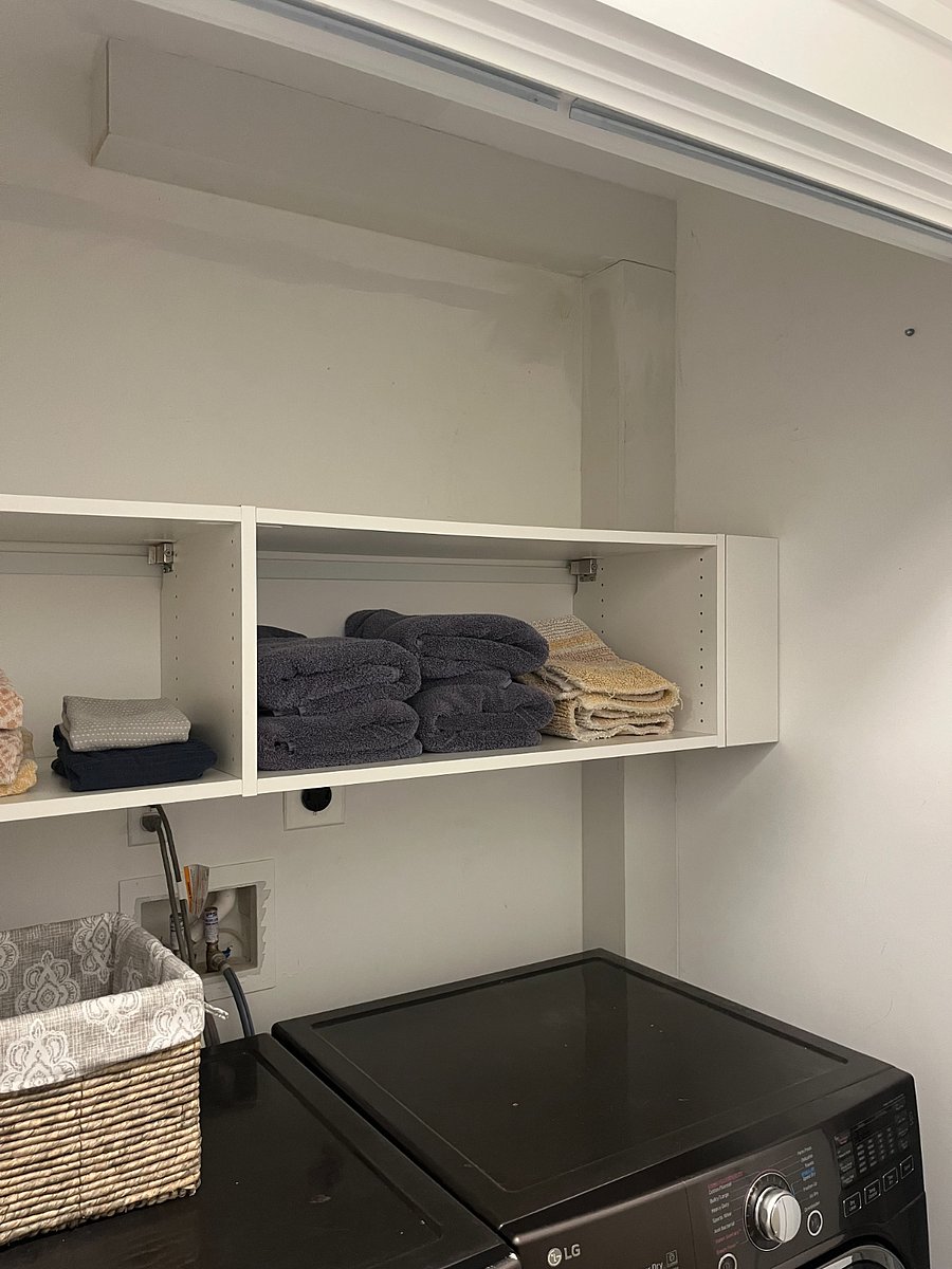 Linen storage over washer/dryer