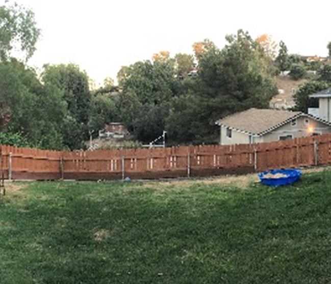 Backyard with view of equestrian trails.