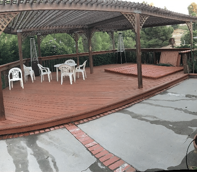 Deck, with patio heaters, new patio furniture, hot tub, and outdoor speakers.