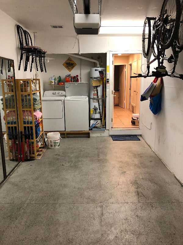 Beach toys, chairs, cooler, two bikes, washer and dryer, beach towels, cleaning supplies