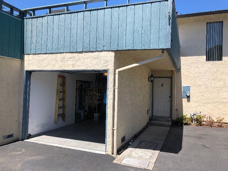 One car garage with garage door opener and remote