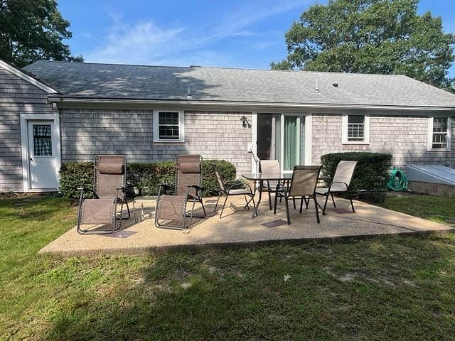 Patio features dining table and zero gravity chairs