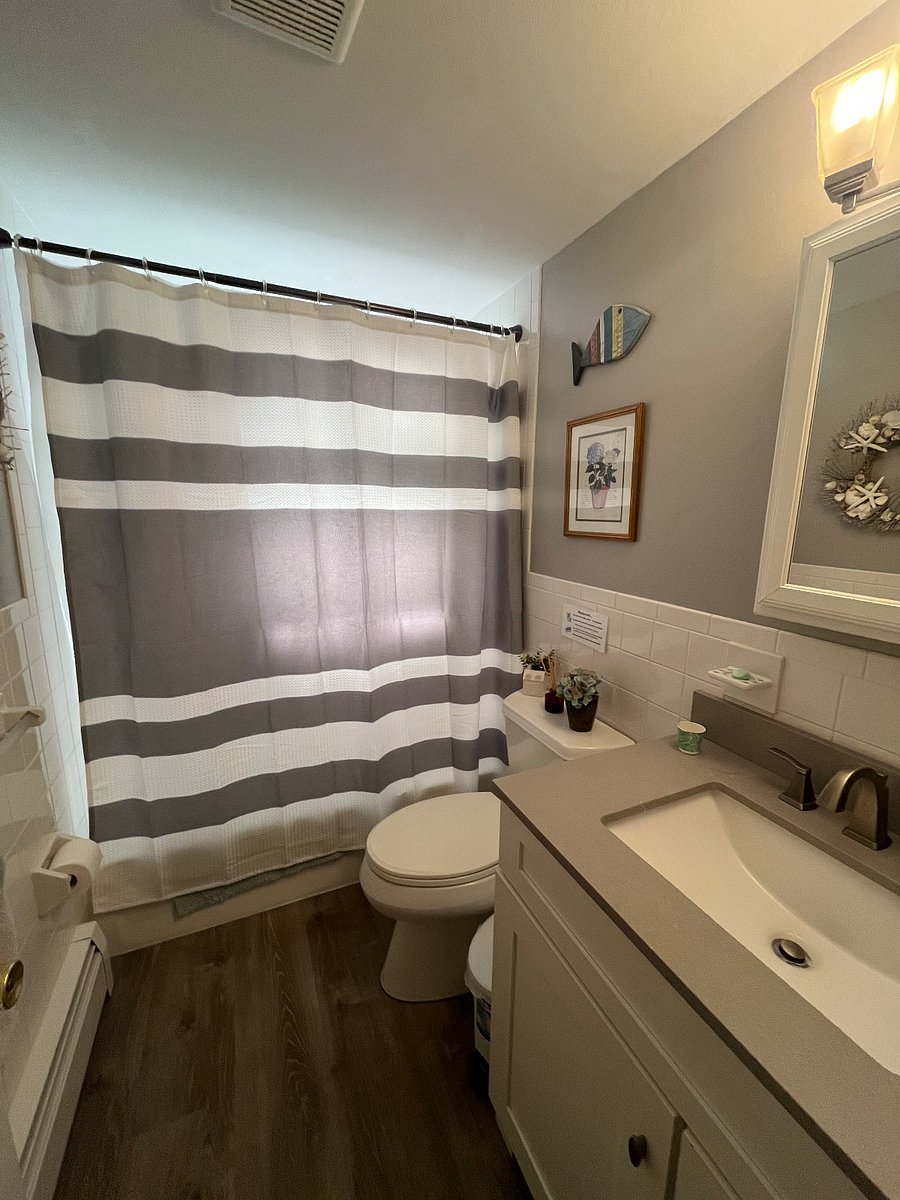 Updated full bath with tub/shower combination. Linen closet with towels and space for your personal items.