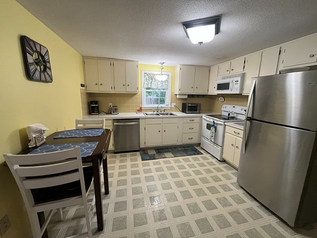 Cabinets and drawers are stocked with everything you need.