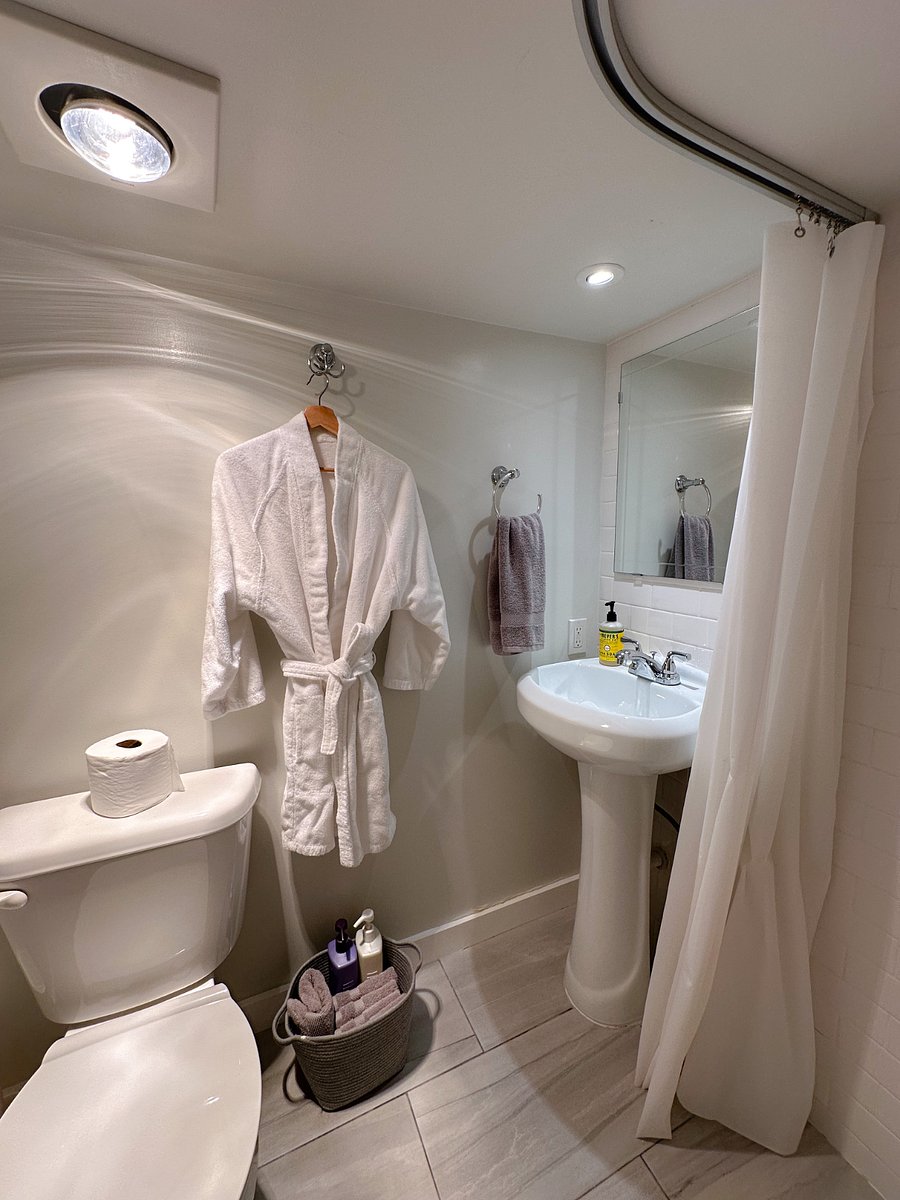 Bath includes bathroom essentials.