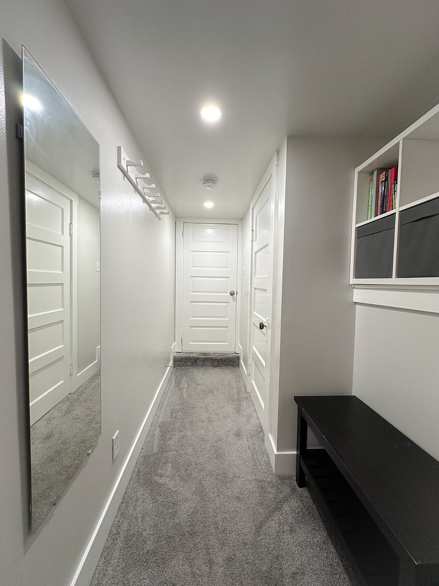 Studio includes closet with clothes hangers.