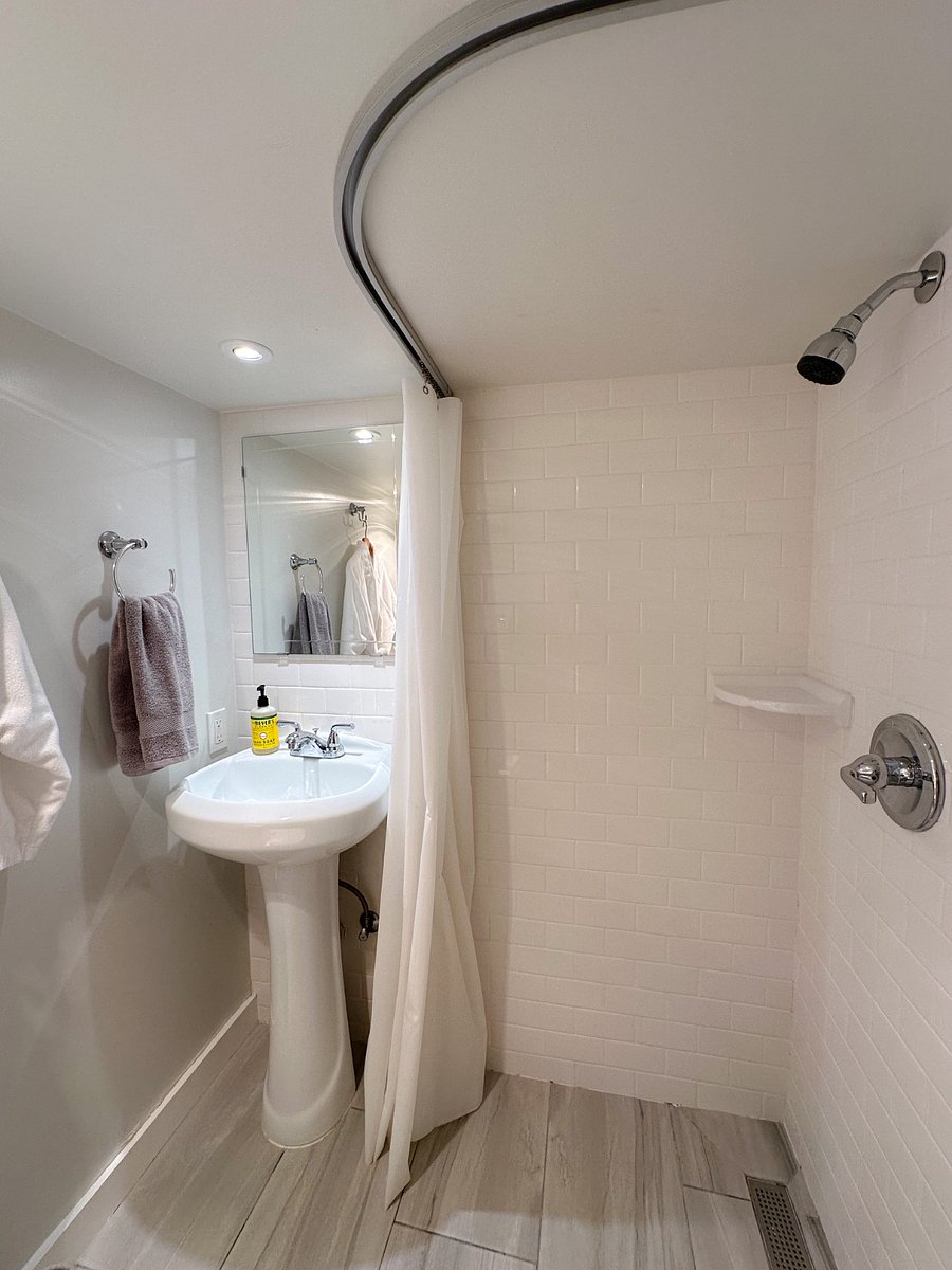 Studio includes a private bath with shower. Please note that there is a step up into the bath and the ceiling is lower than average.
