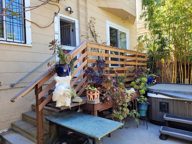 Own deck and private entrance at rear of property
