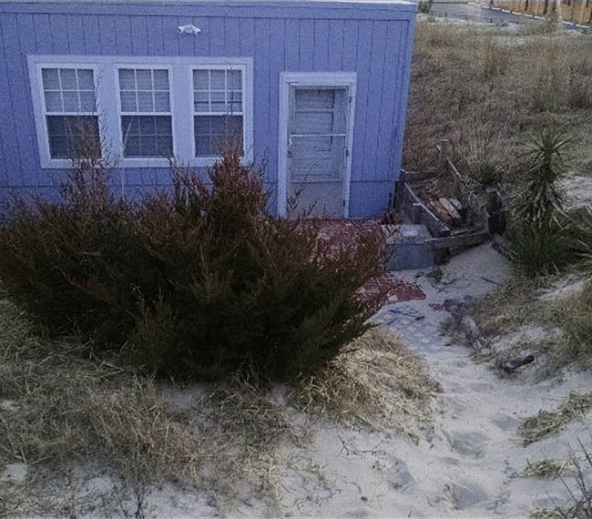 View of house from top of dune.