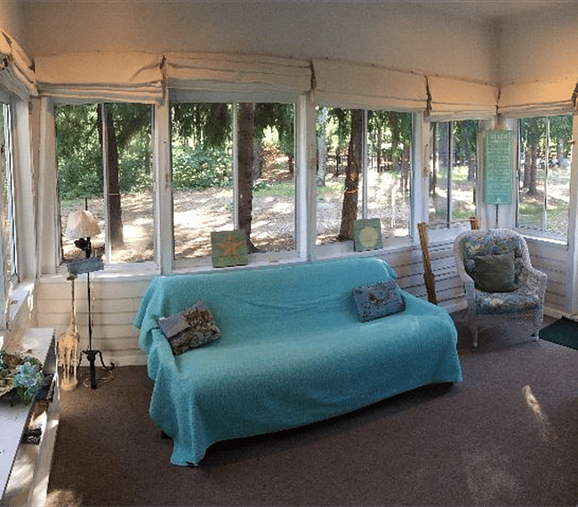 View from the sun-room (not heated) into the side yard.