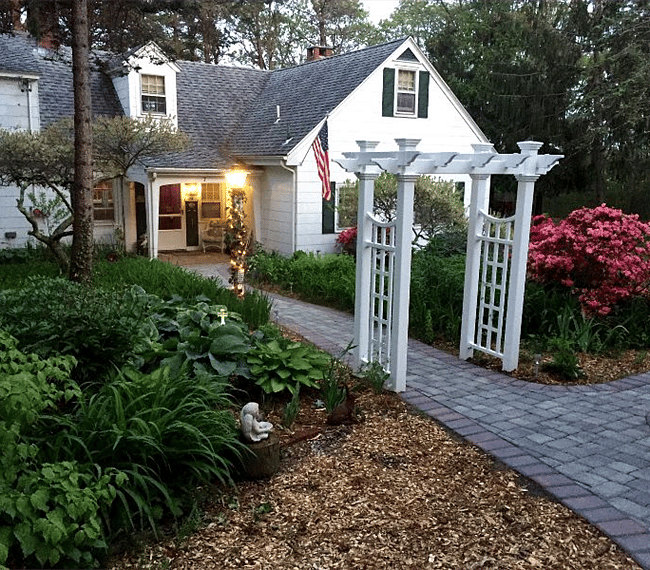 Walkway from concrete driveway to main entrance.  Guest unit is on the right.