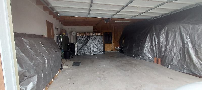 2 cars Garage with our personal belongings covered...